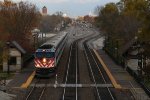 METX 186 starts to accelerate again after crossing the new track on the bridge